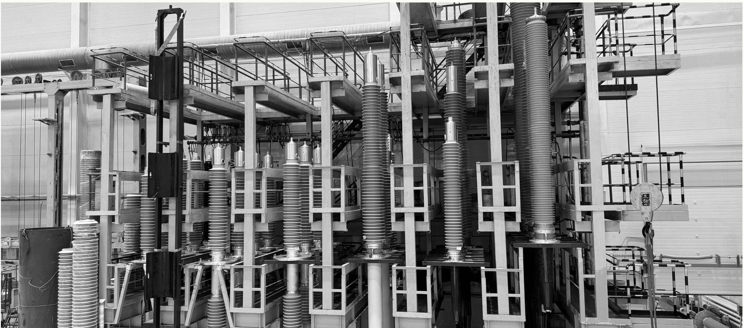High-voltage bushings installed in a substation switchyard
